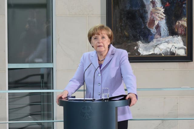 Chancellor Angela Merkel joined other eurozone leaders in giving her wholehearted backing to last-minute breakthrough deal with Greece and declared she supported the outcome with 'complete conviction'