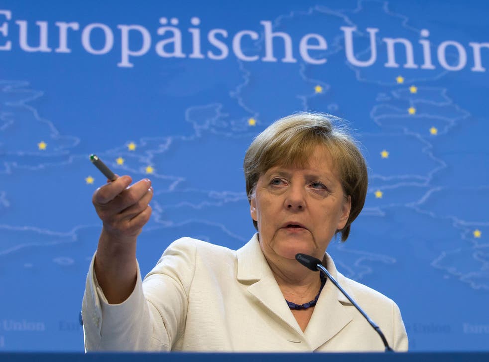 German chancellor Angela Merkel giving a final press conference at the end of a Eurozone leader summit on the Greek crisis