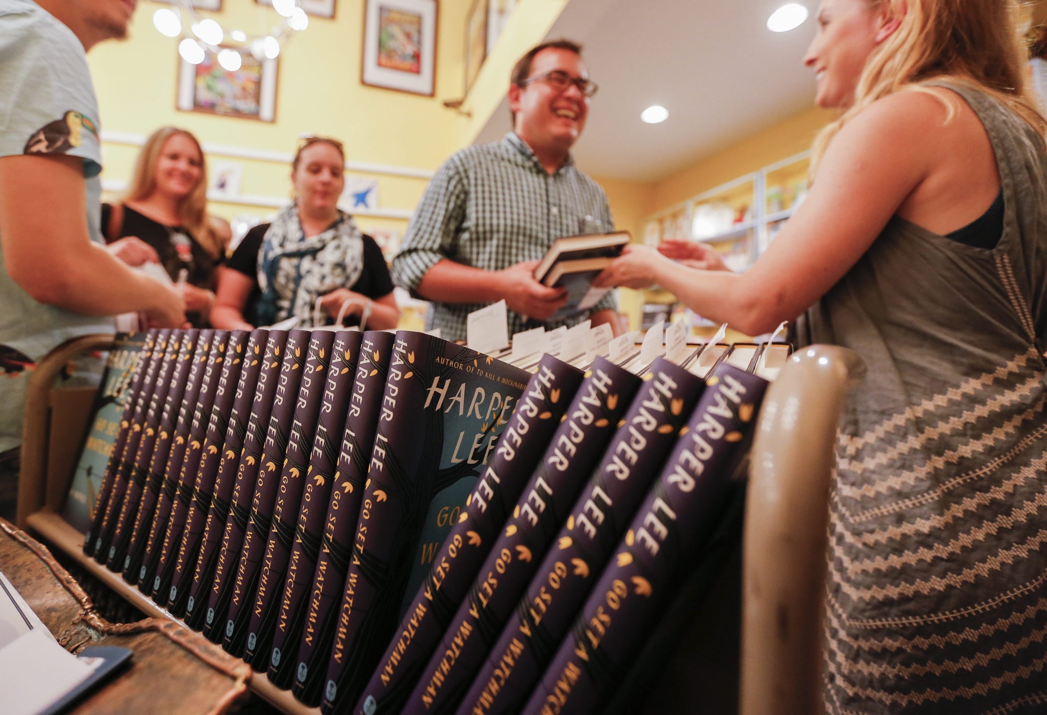 Book enthusiasts pick up their copies of Go Set A Watchman at the Little Shop of Stories in Decatur, Georgia