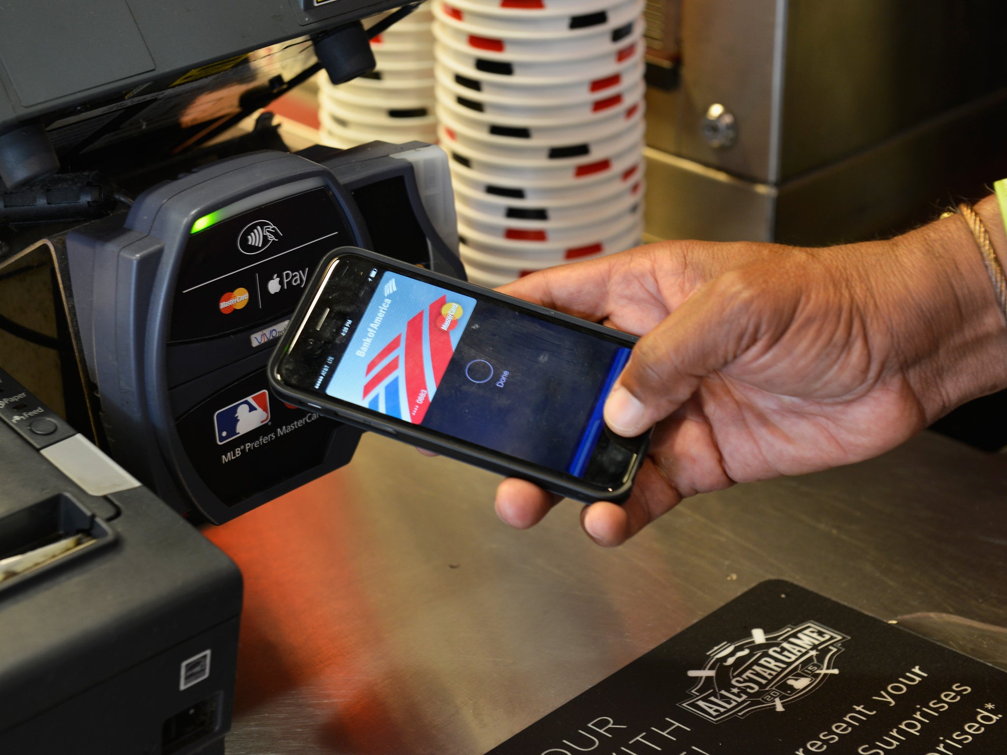 Ozzie Smith uses Apple Pay at the Home Run Derby at Great American Ball Park on July 13, 2015 in Cincinnati, Ohio