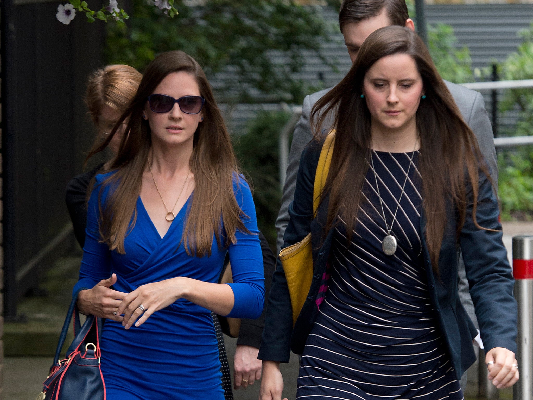 The widow of Corporal James Dunsby, Bryher Dunsby (left), arrives at the Civic Suite in Solihull for the inquest into her husband's death