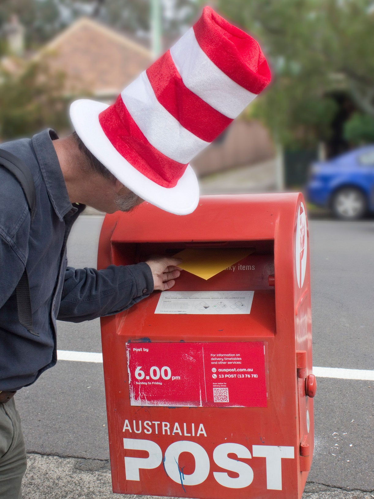 The 'Cat in the Hat' was photographed inviting an army officer to play hide and seek with him