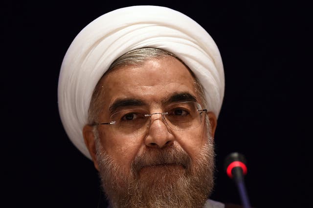 Iranian President Hassan Rouhani speaks during press conference in New York on September 26, 2014.