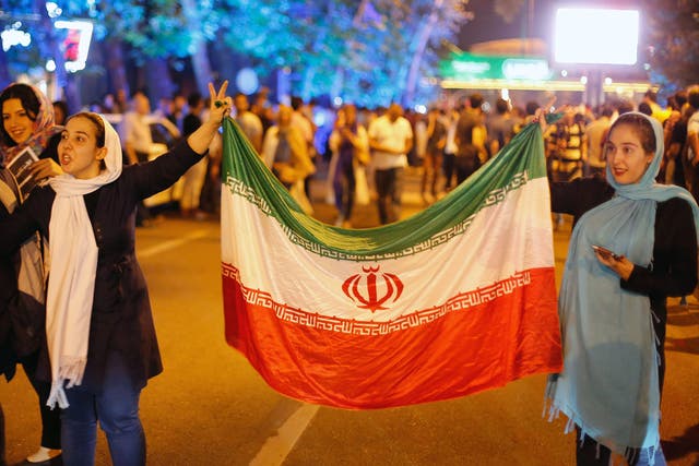 Iranians celebrate in the streets of Tehran