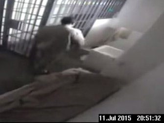 The video shows grainy footage of Joaquin 'El Chapo' Guzman in his cell at the Altiplano prison