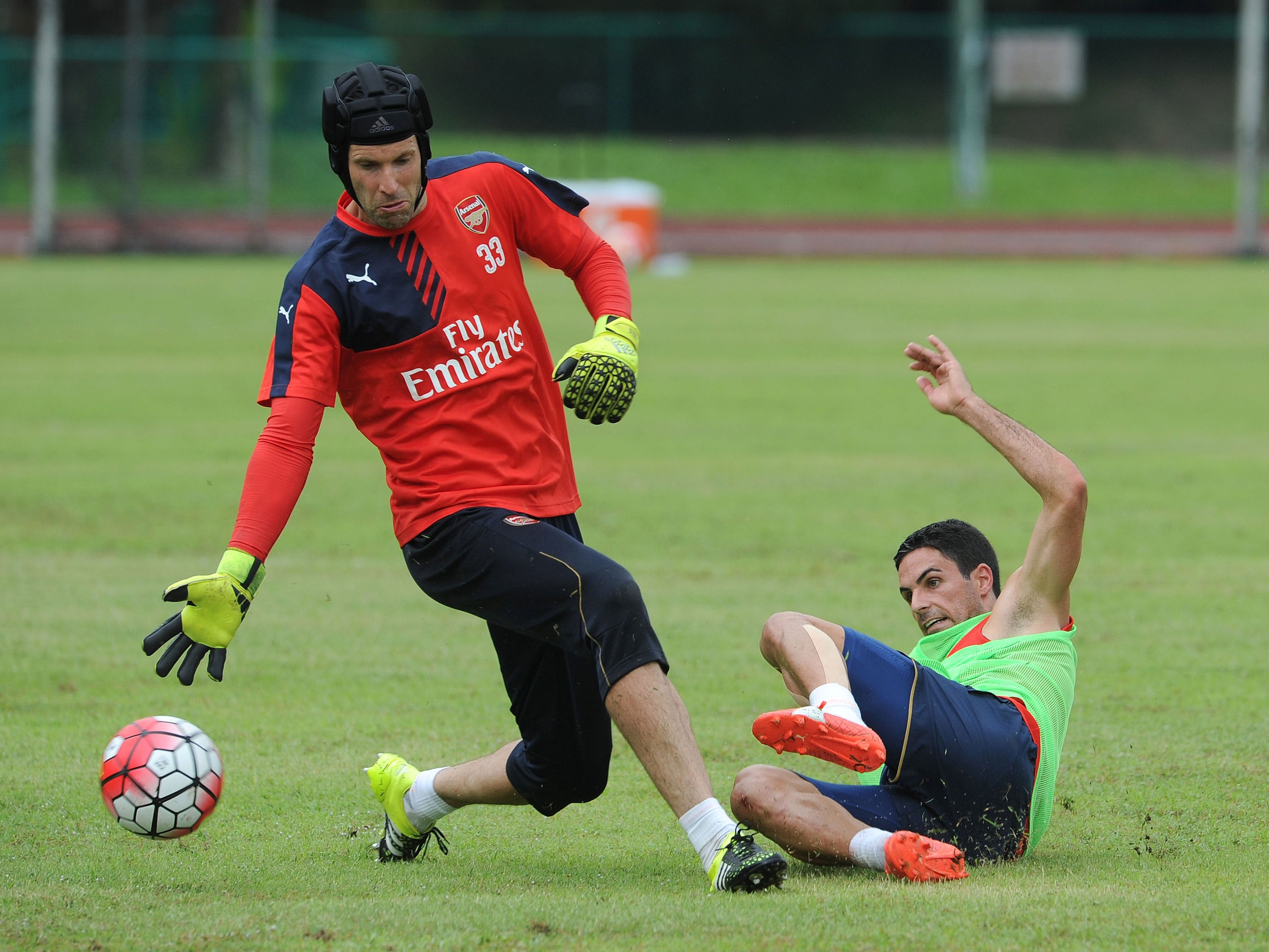 Petr Cech and Mikel Arteta during Arsenal training in Singapore