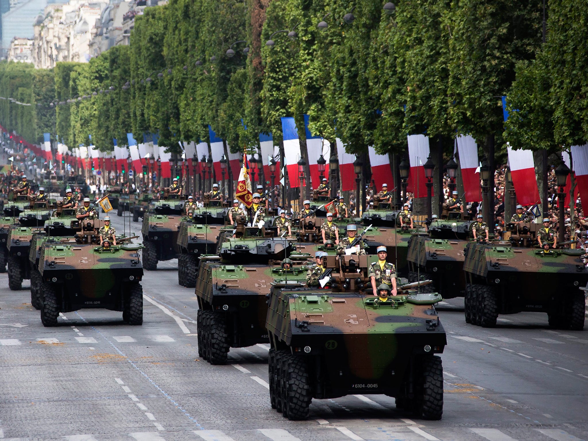 French armoured vehicles, known as 'VBCI' (Combat Infantry Armored Vehicle) drive down the Champs-Elysees