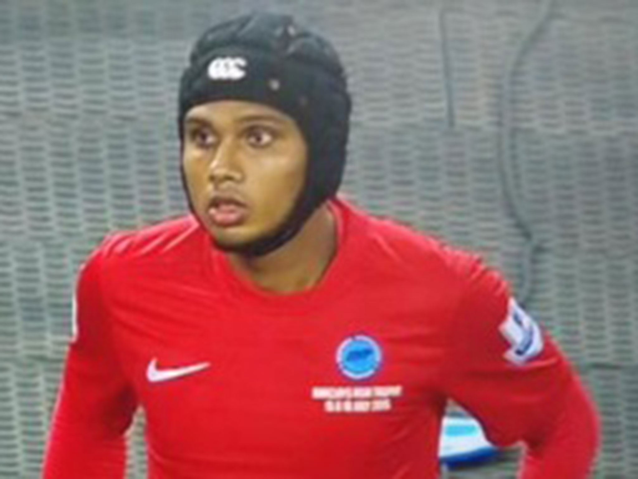 Fazrul Nawaz wears the Petr Cech-style hat against Arsenal