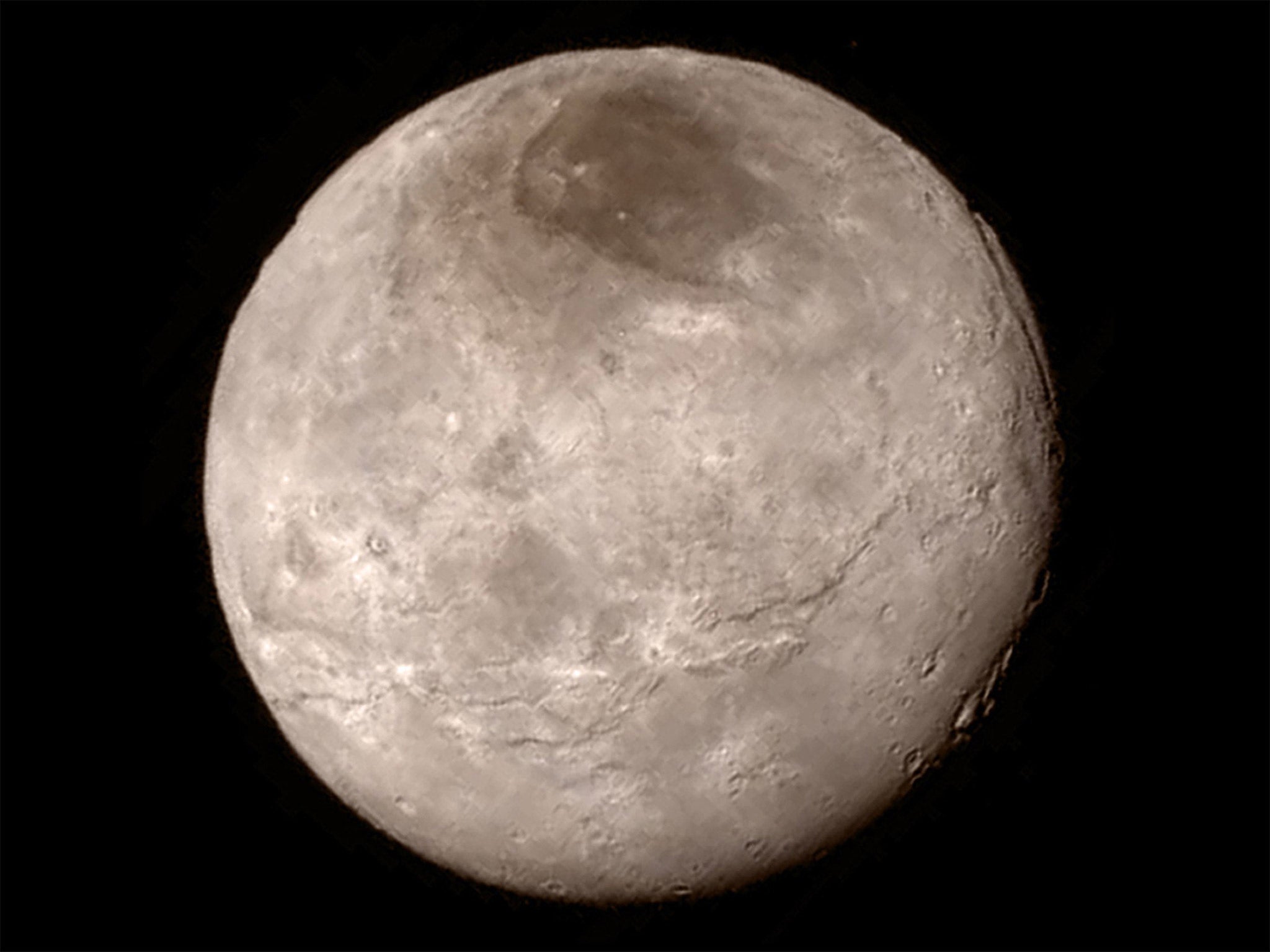 Charon, Pluto's largest moon, in a image taken from a distance of 289,000 miles (466,000 kilometers)