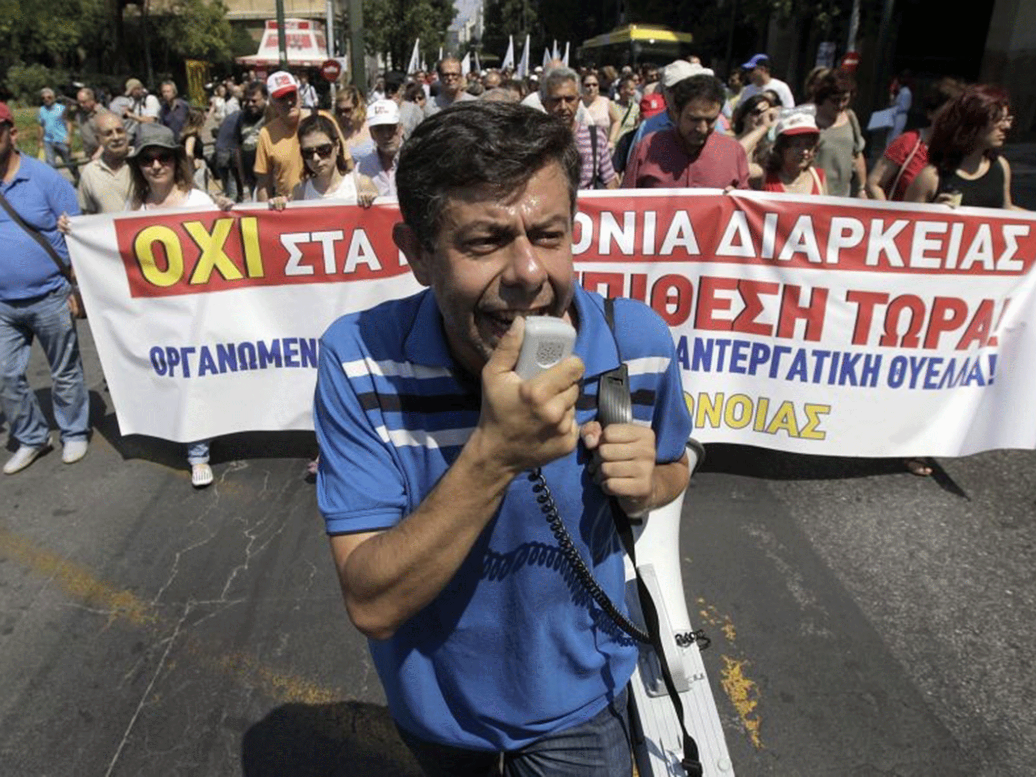 Civil servants protest during a 24 hour nationwide strike in Athens on Wednesday