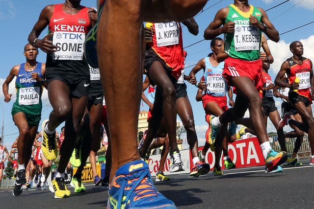 Superhuman effort: Kenya's Peter Kimeli Some runs through Red Square during a race in Moscow, 2013