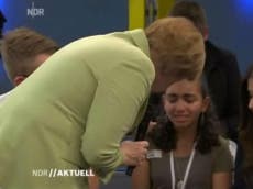 Palestinian girl defends Angela Merkel after crying during speech