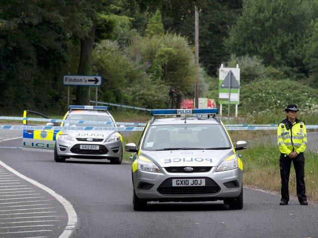 Police close to the scene where a man was stabbed to death by another motorist in Findon