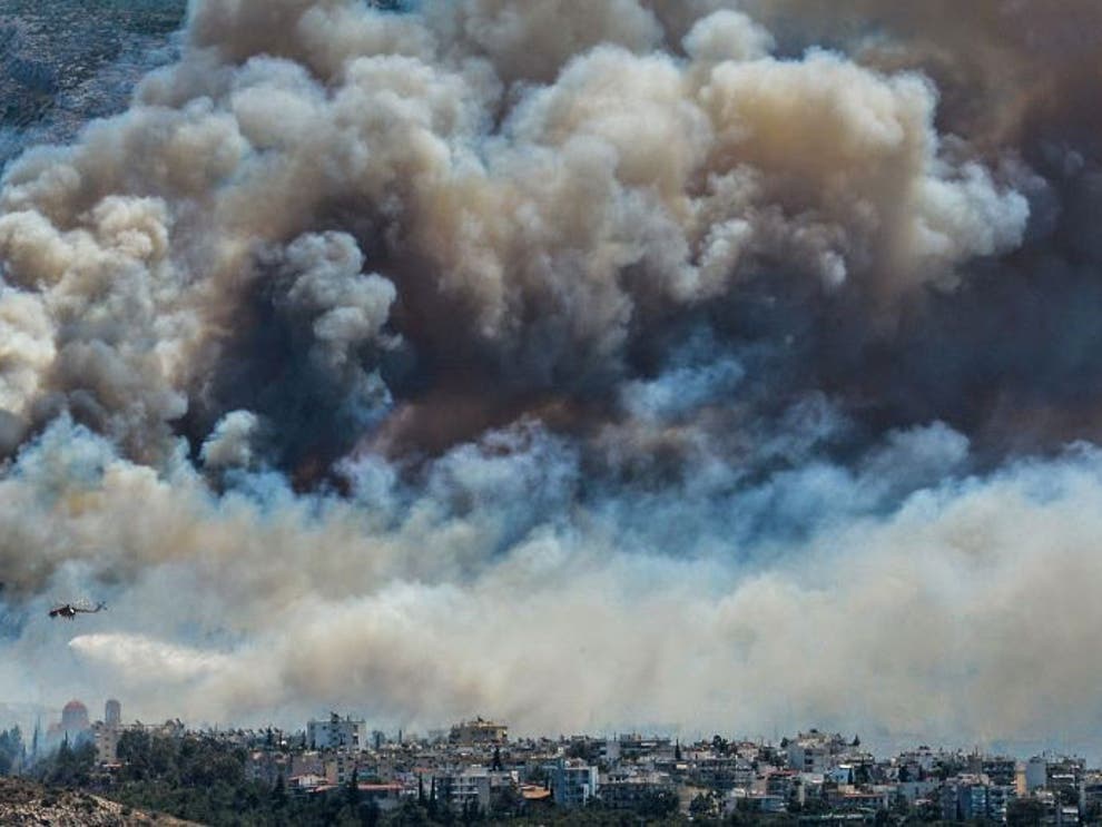 Athens fire Greek capital smothered in smoke as mountainside blaze