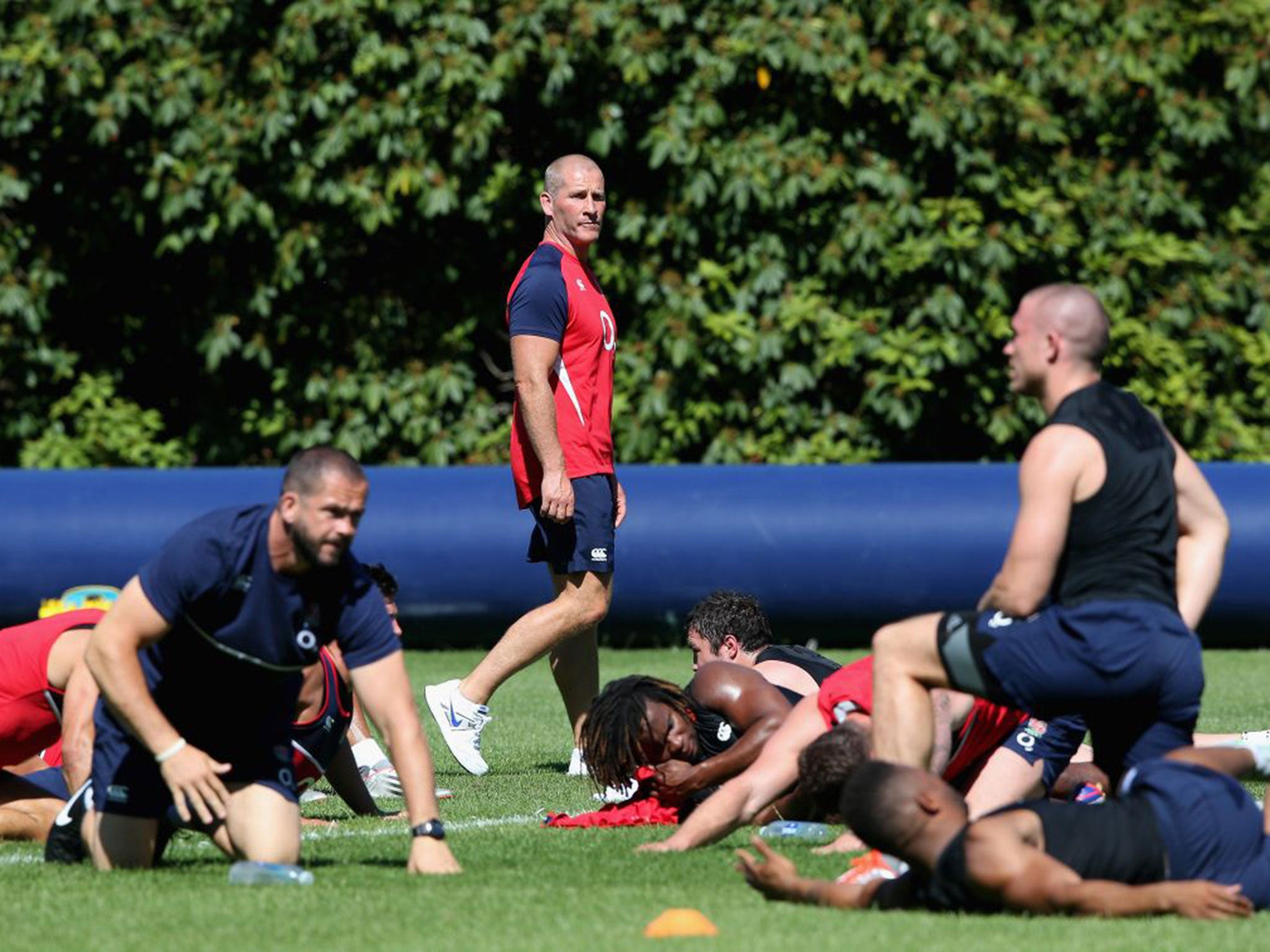 Stuart Lancaster, the England head coach looks on during the England training session held at Pennyhill Park on June 30, 2015