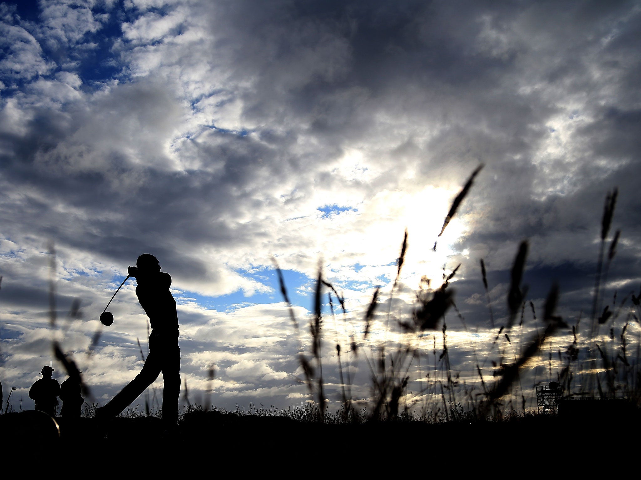 Jordan Spieth plays a shot early on Saturday morning