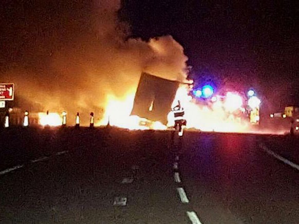 Part of the road melted after a lorry was engulfed in flames on the M6