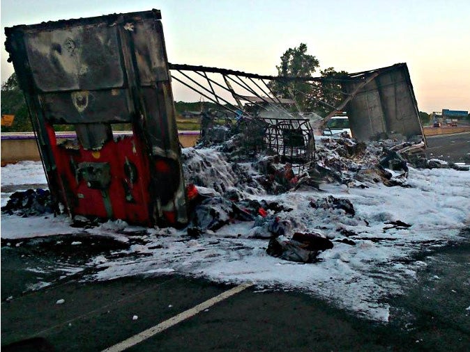 Remains of lorry which exploded in flames on the M6 and melted the road