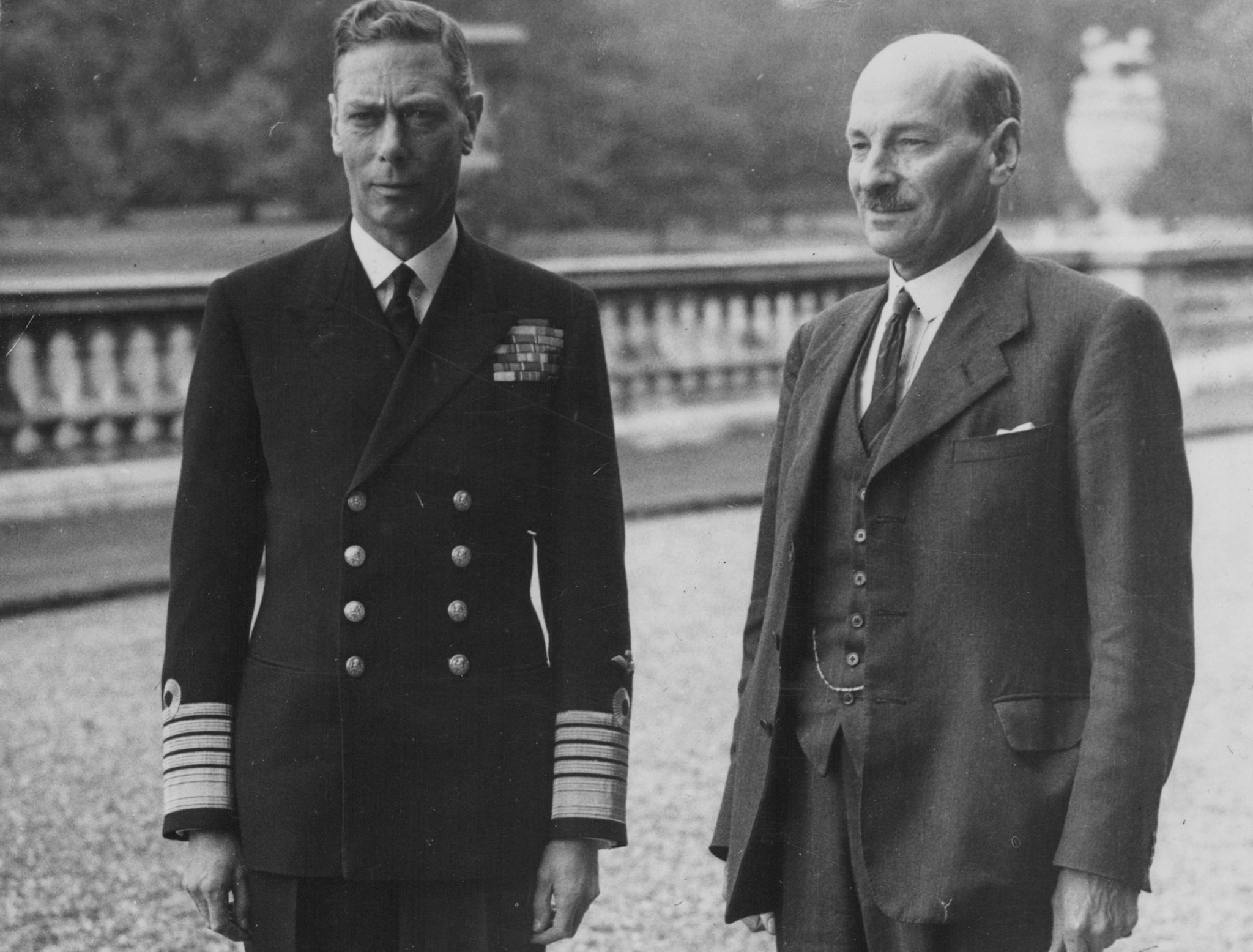 Queen Elizabeth's father George VI, left, pictured with Clement Attlee in 1945