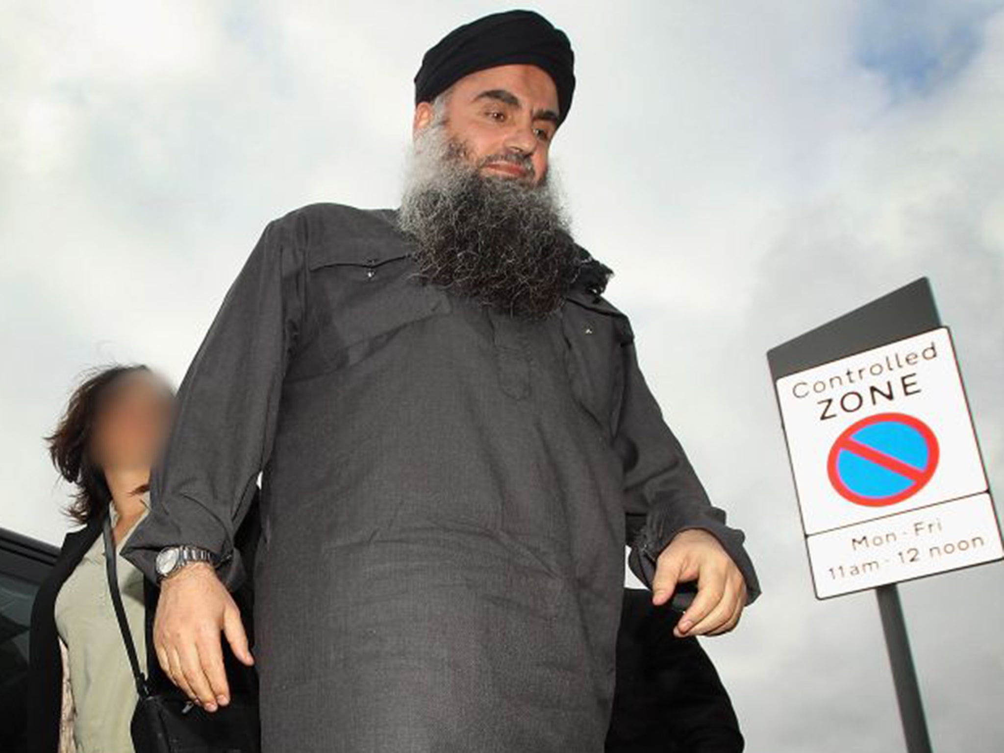 Muslim cleric Abu Qatada arrives at his London home after being released from prison in November 2012