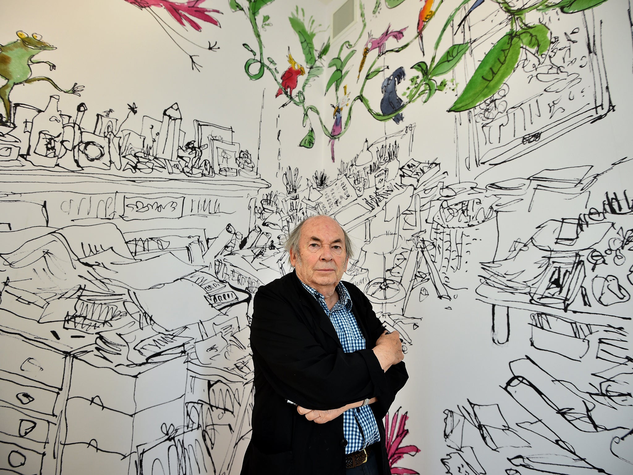 British cartoonist and illustrator Quentin Blake poses for photographers during the press preview of his exhibition at the House of Illustration in 2014