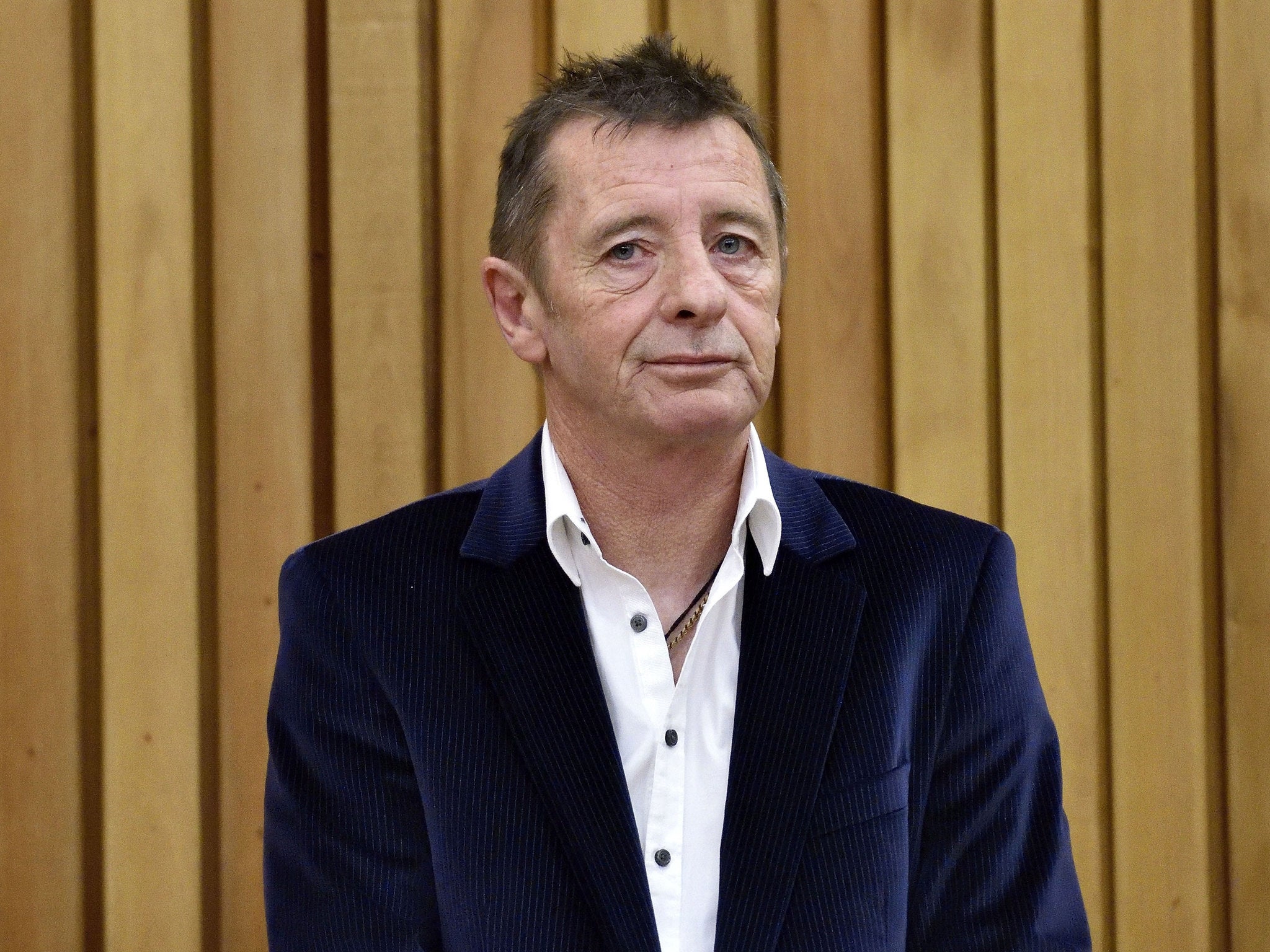 Former AC/DC drummer Phil Rudd sitting in the dock as he awaits sentencing on July 9, 2015