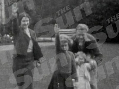 The footage appears to show the Queen giving a Nazi salute