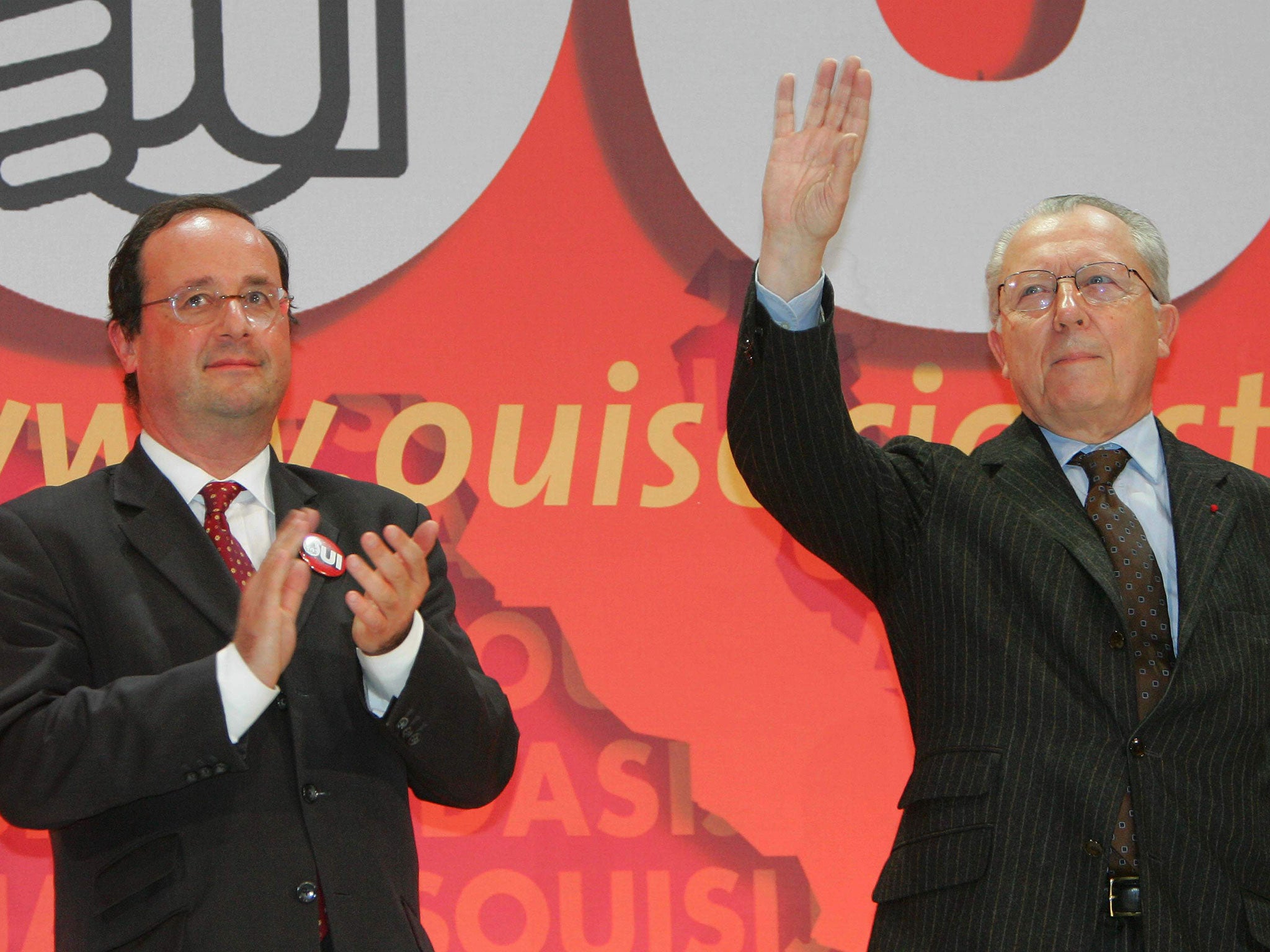 François Hollande, left, used the birthday of Jacques Delors, with whom he campaigned for a Yes vote in a 2005 EU referendum, to call for the currency bloc to move towards a federal system