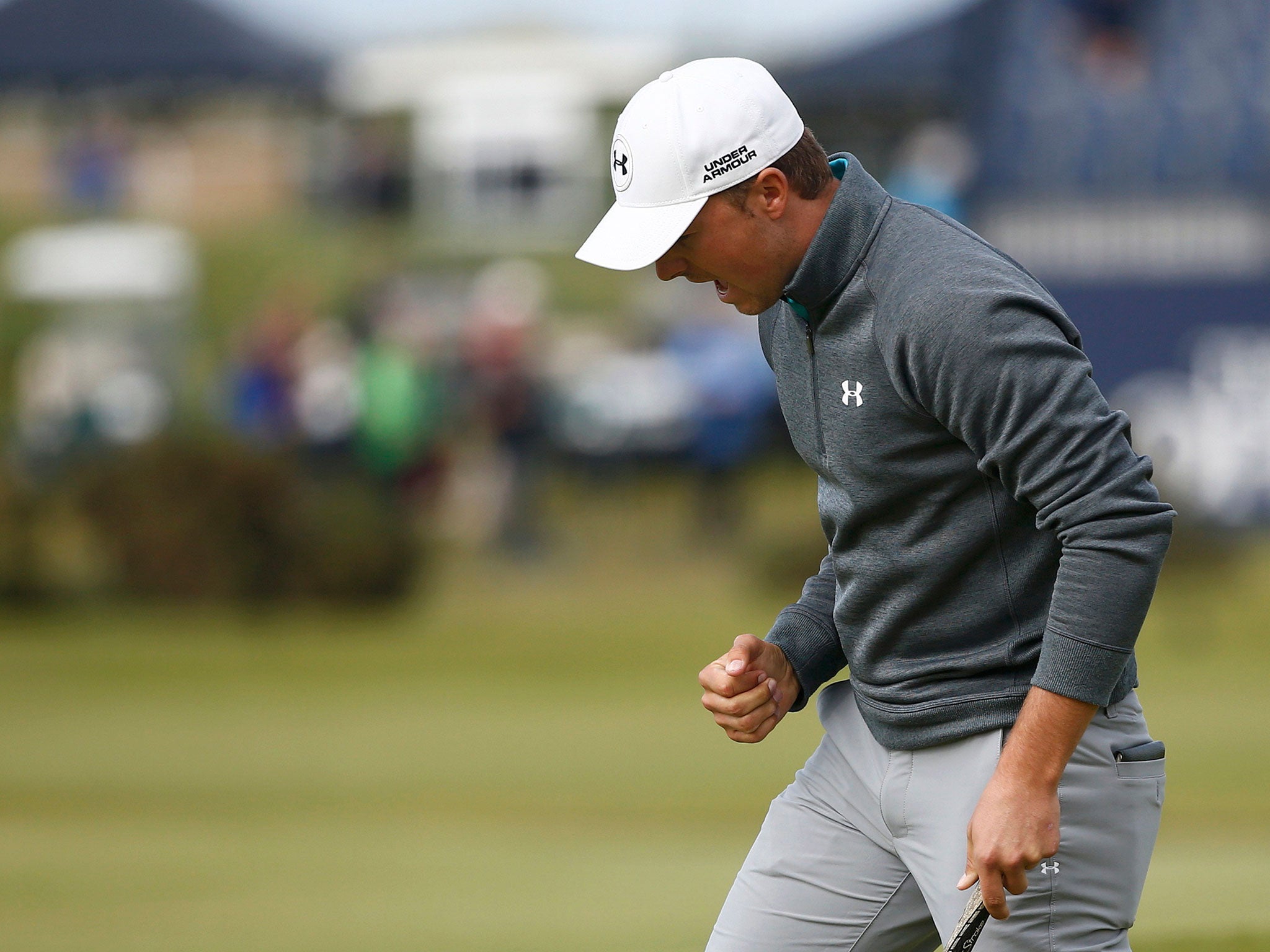 Jordan Spieth roars after a birdie on 15