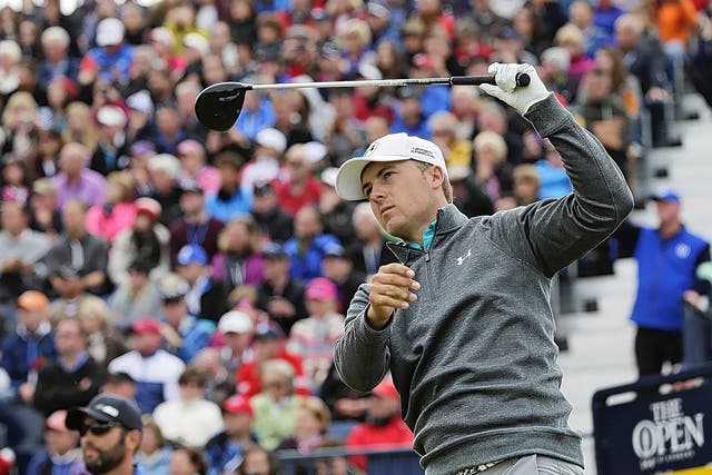 Jordan Spieth watches his tee shot on the 17th during Sunday’s third round of the Open