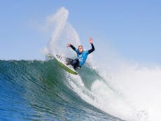 Mick Fanning returns to ocean after shark attack for 60 Minutes