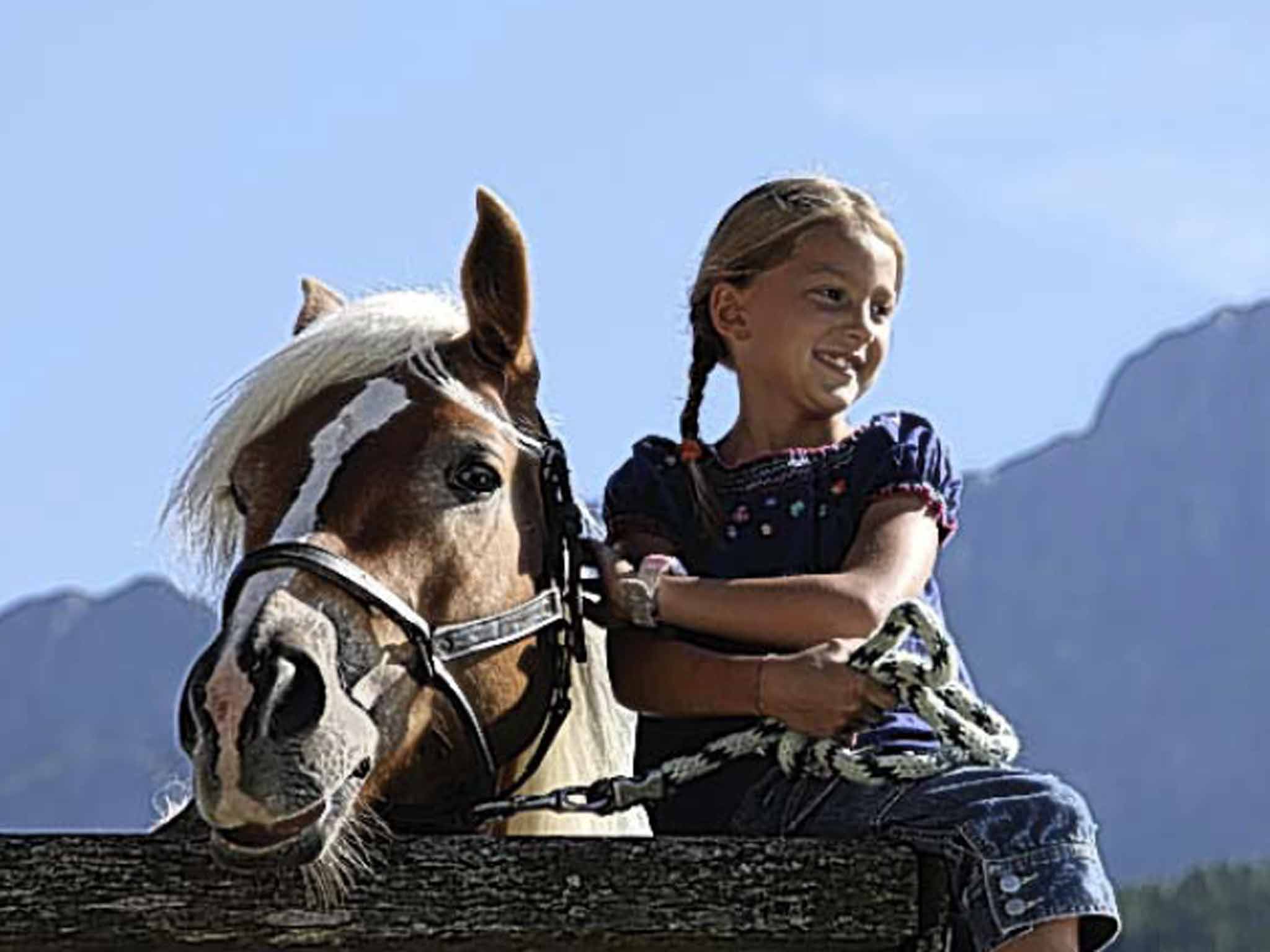 Go horse-riding in the Dolomites