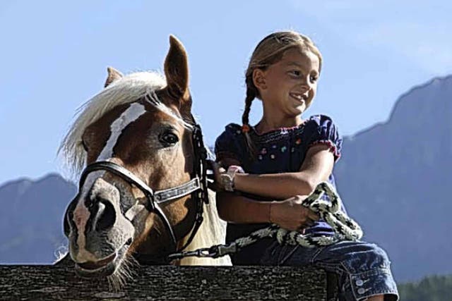 Go horse-riding in the Dolomites