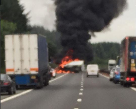 A van was seen on fire on the M8 on Monday morning