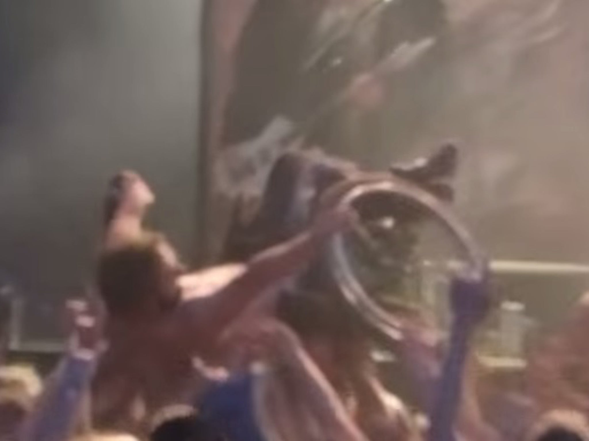 Fan-filmed footage of Arch Enemy’s set at the Dynamo Metalfest in Eindhoven shows a fan crowd surfing using a wheelchair.