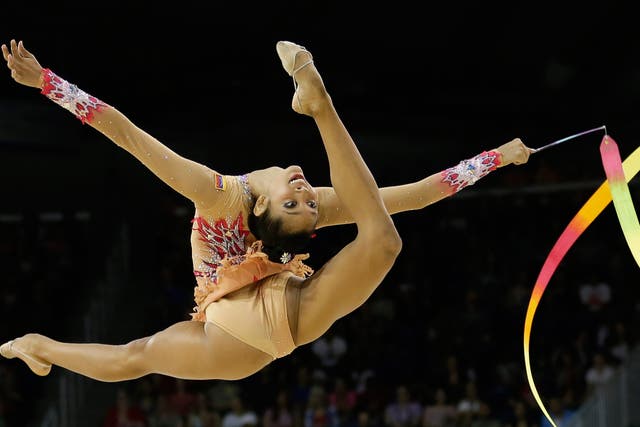 Venezuela's Grisbel Lopez performs with the ribbon during individual all-around rhythmic gymnastics competition in the Pan Am Games in Toronto