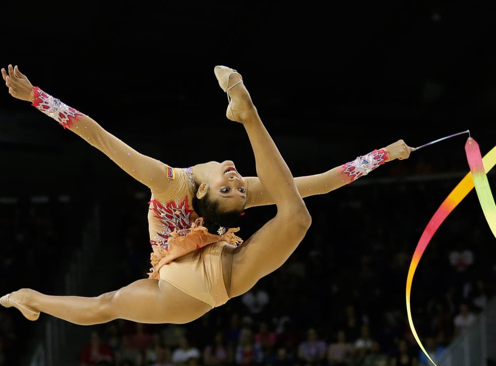 Venezuela's Grisbel Lopez performs with the ribbon during individual all-around rhythmic gymnastics competition in the Pan Am Games in Toronto