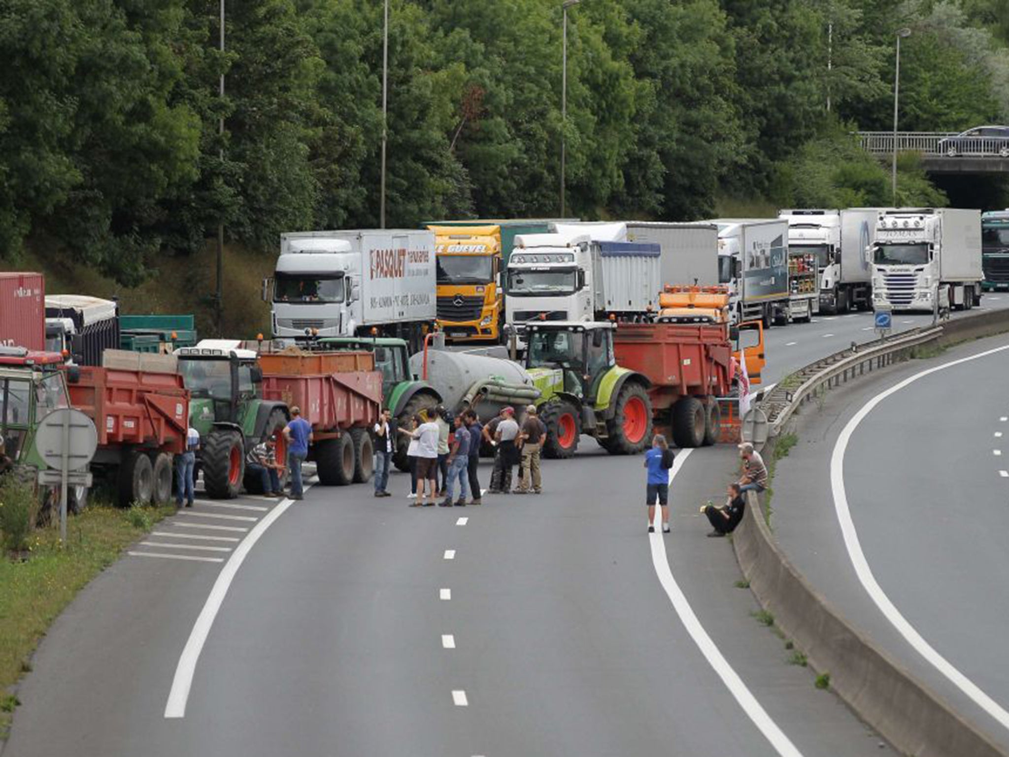 French farmers block a major road near Caen on Monday