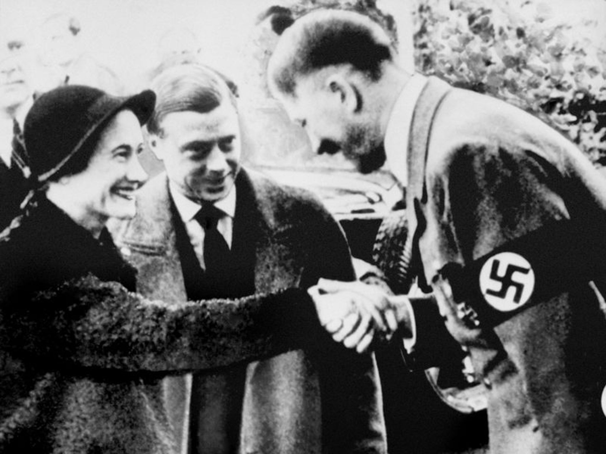 A photo from 1937 of the Duke and Duchess of Windsor meeting with German leader Adolf Hitler in Munich