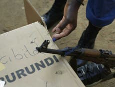'Don't film me' Burundi voters tell reporters as they wash off ink