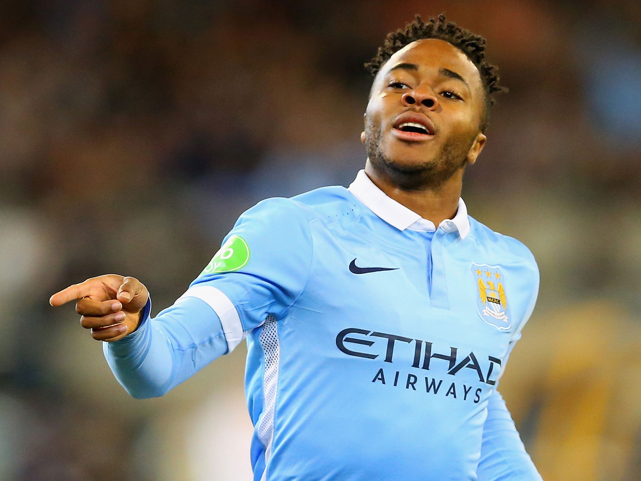 Raheem Sterling celebrates his goal for Manchester City