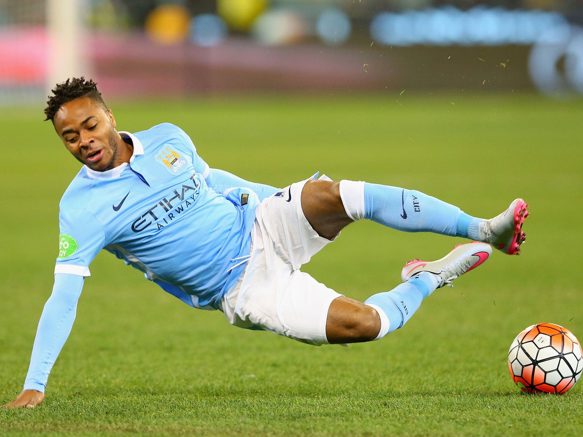 Raheem Sterling slips over after his first touch for City