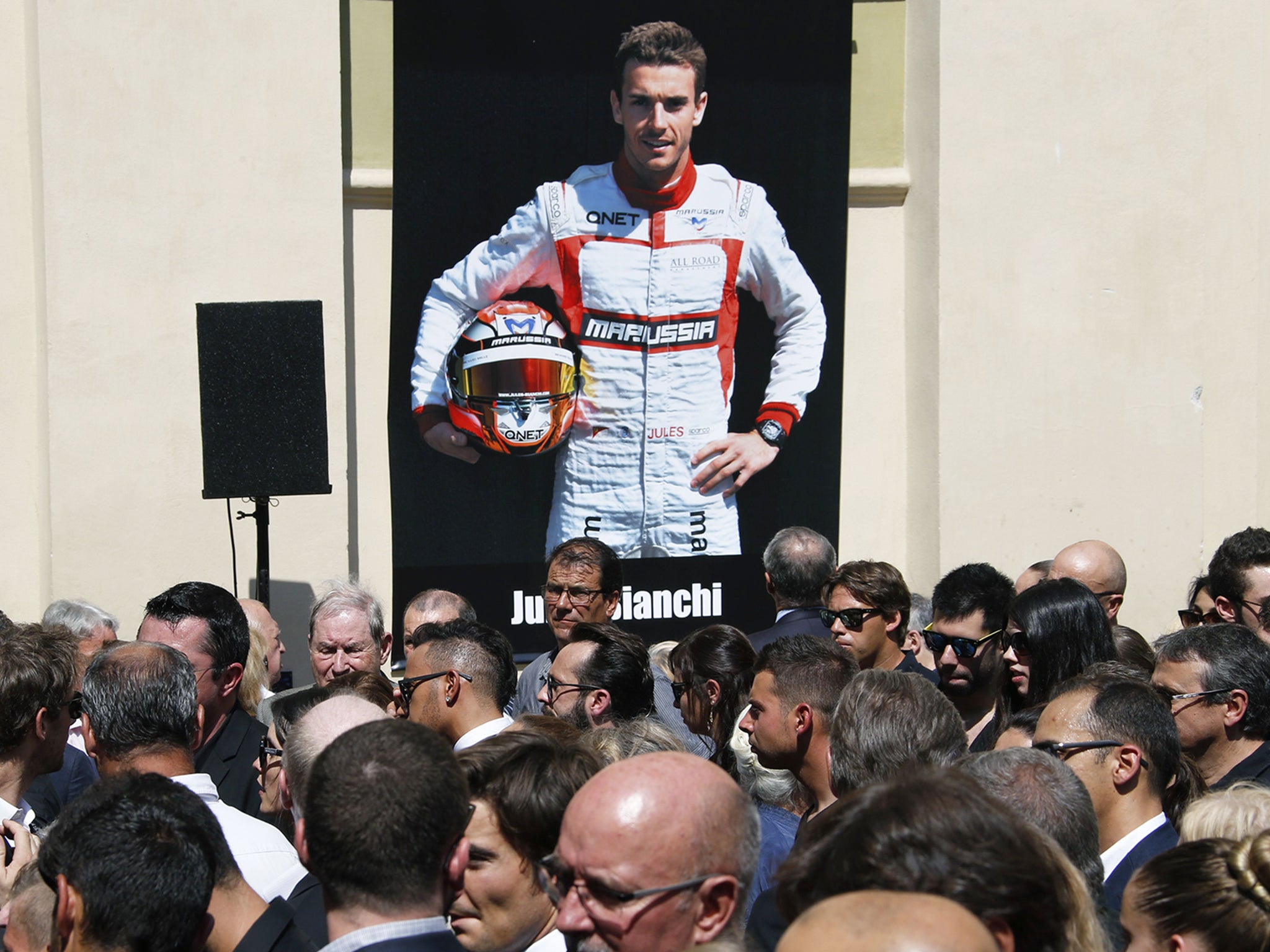 A portrait of Bianchi hangs outside the Cathedrale Sainte Reparate in Nice