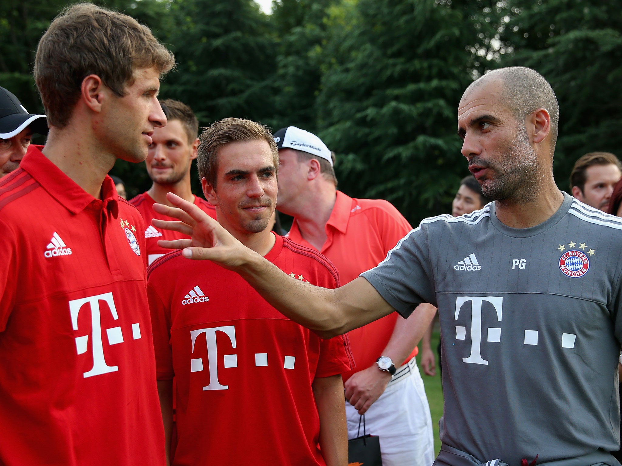 Pep Guardiola with Thomas Muller and Philipp Lahm