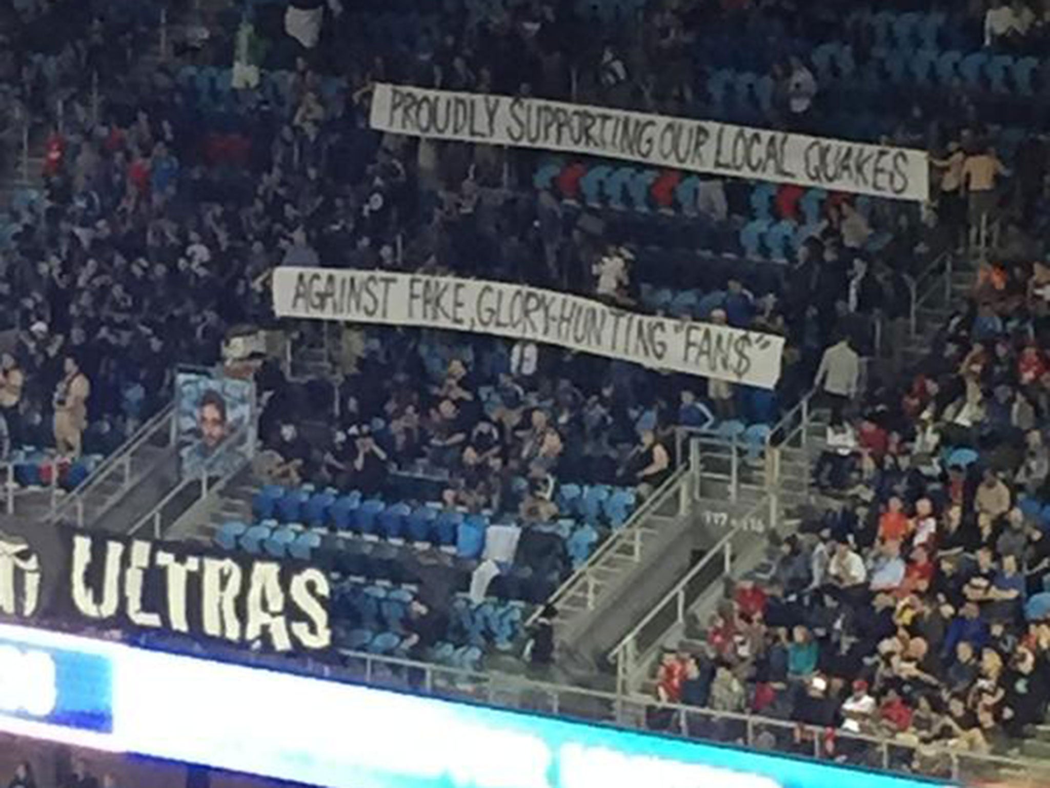 San Jose Earthquakes' fans display a banner to jibe Manchester United supporters