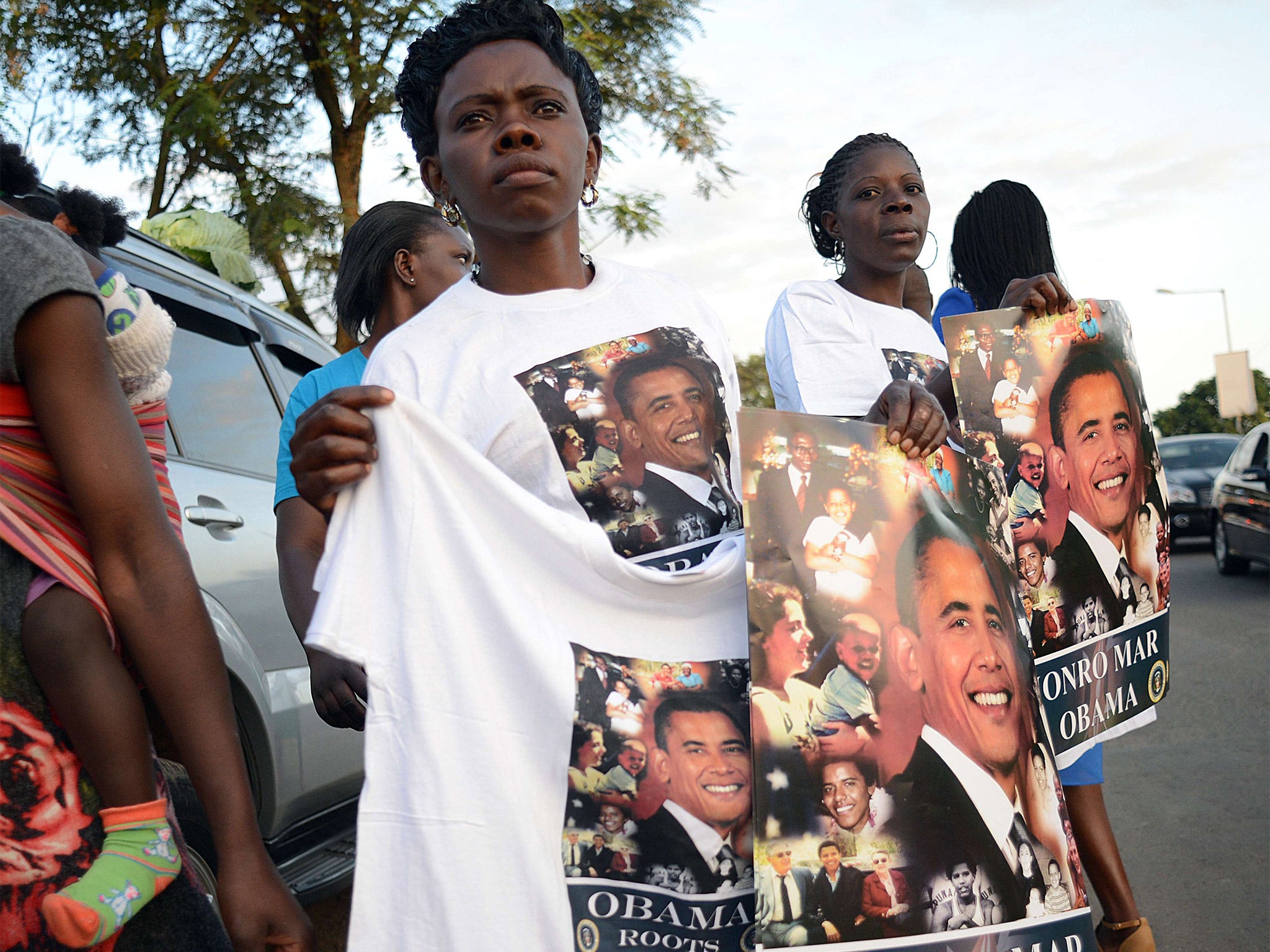 A street seller offers posters and T-shirts in Nairobi (Getty)