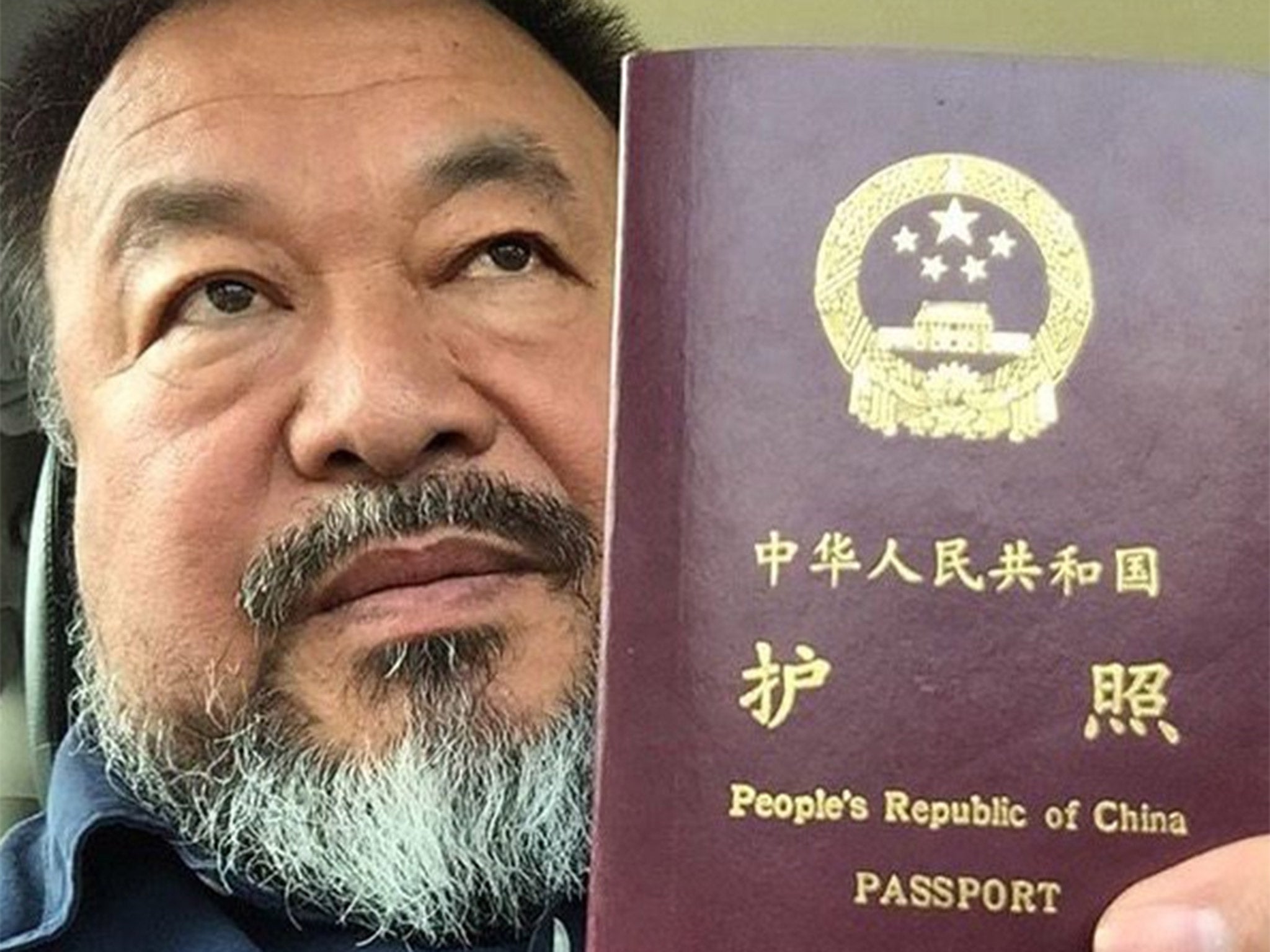 Ai Weiwei posted a picture of himself on Instagram with the caption: ‘Today, I got my passport’