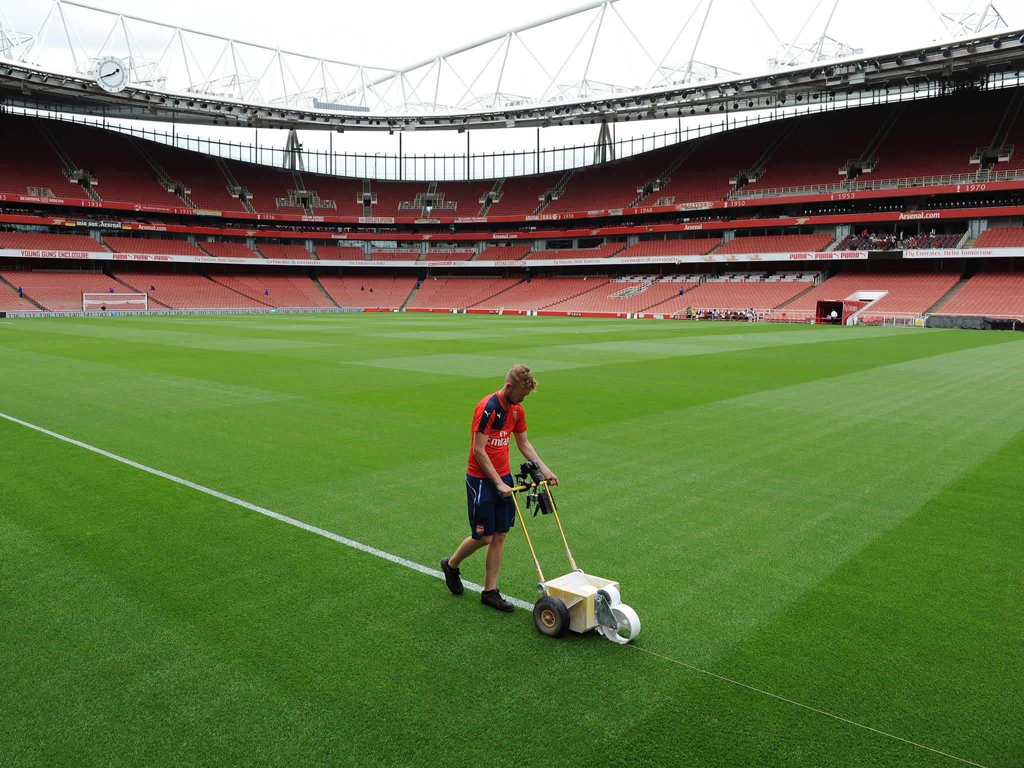 The Emirates pitch is marked out ahead of the new season by Arsenal Groundsman Reece Watson (Getty)