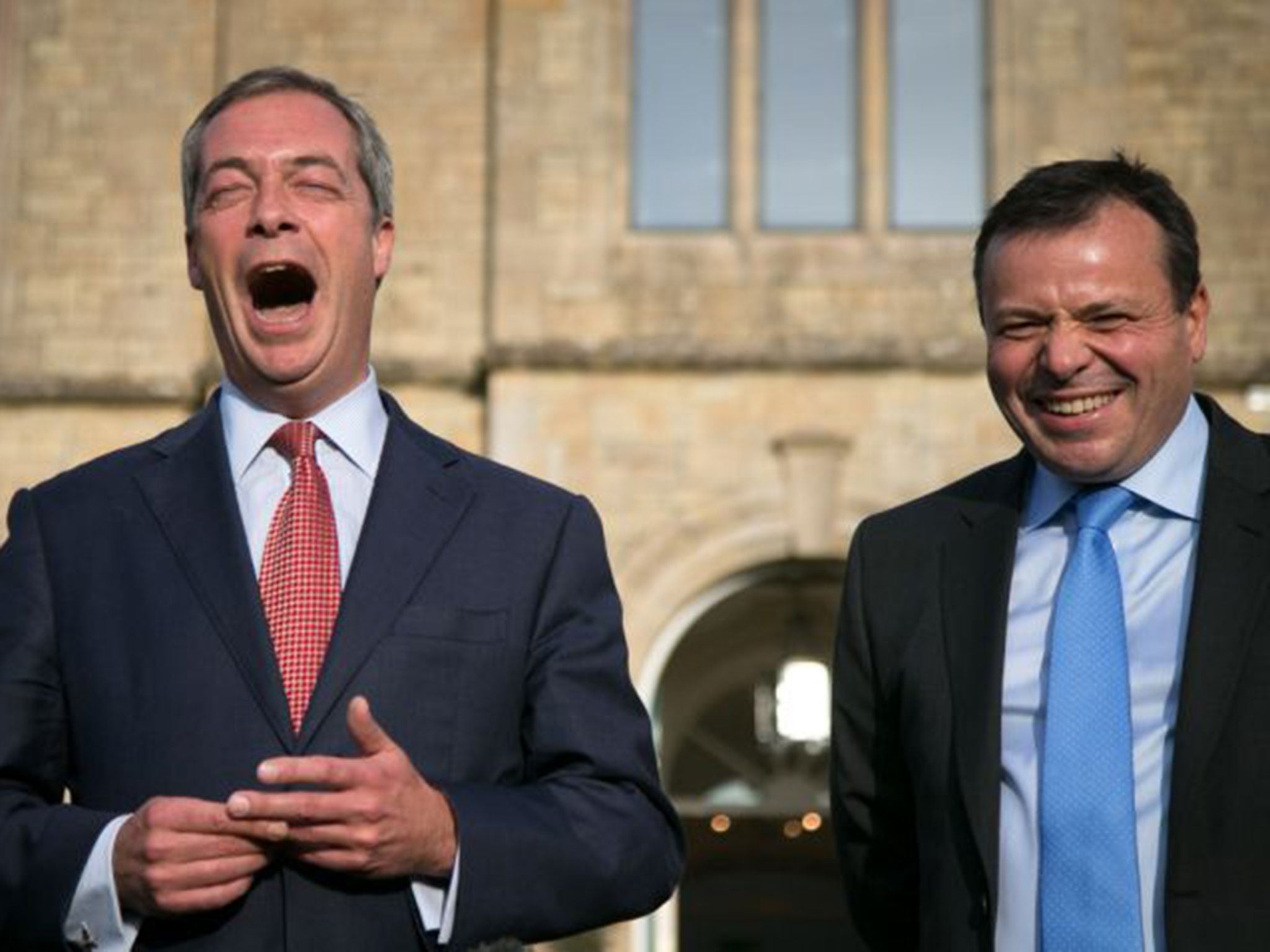 Leader of Ukip Nigel Farage (L) holds a press conference with the party's new donor Arron Banks