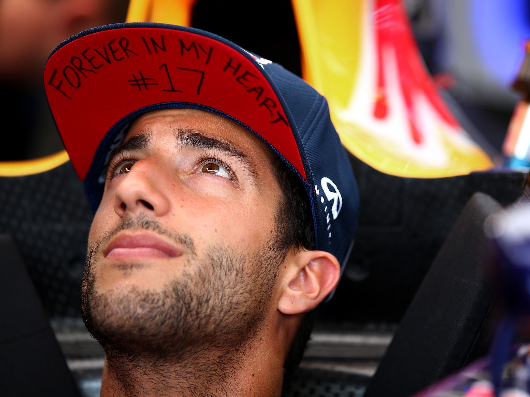 Red Bull driver Daniel Ricciardo sports a tribute to Jules Bianchi on his cap yesterday in Budapest